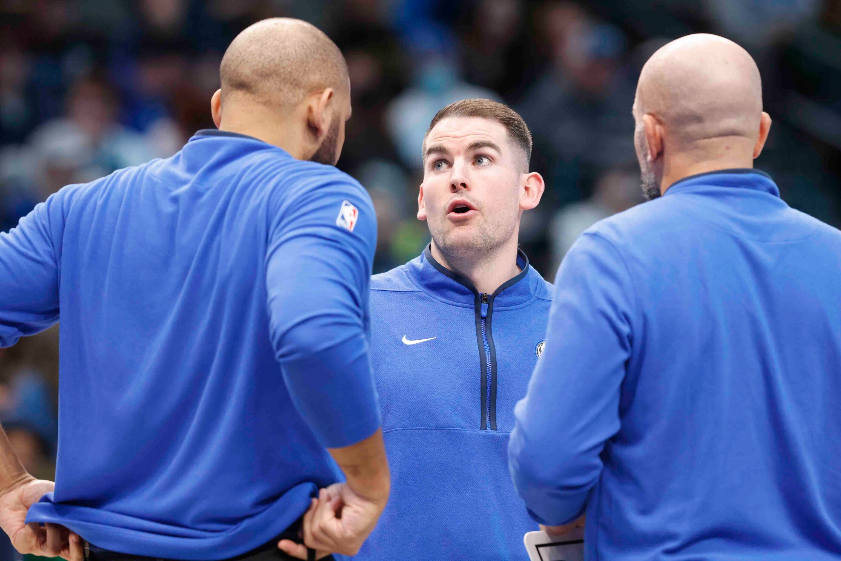 Dallas Mavericks Greg St. Jean, center, during the first half of an NBA game against...