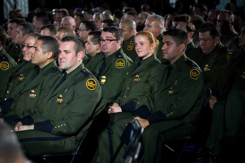 Border Patrol agents listen to President Donald Trump in Washington, D.C. speak of...