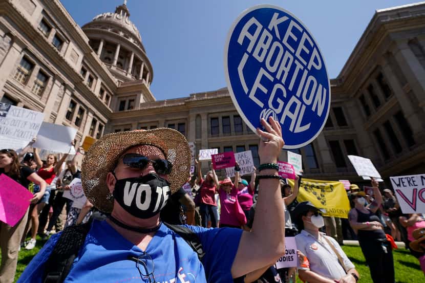 Abortion rights demonstrators attend a rally at the Texas Capitol in Austin, May 14, 2022....