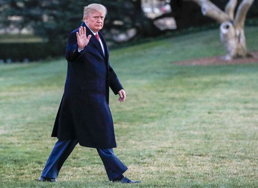 President Donald J. Trump waved as he walks across the South Lawn towards the White House on...