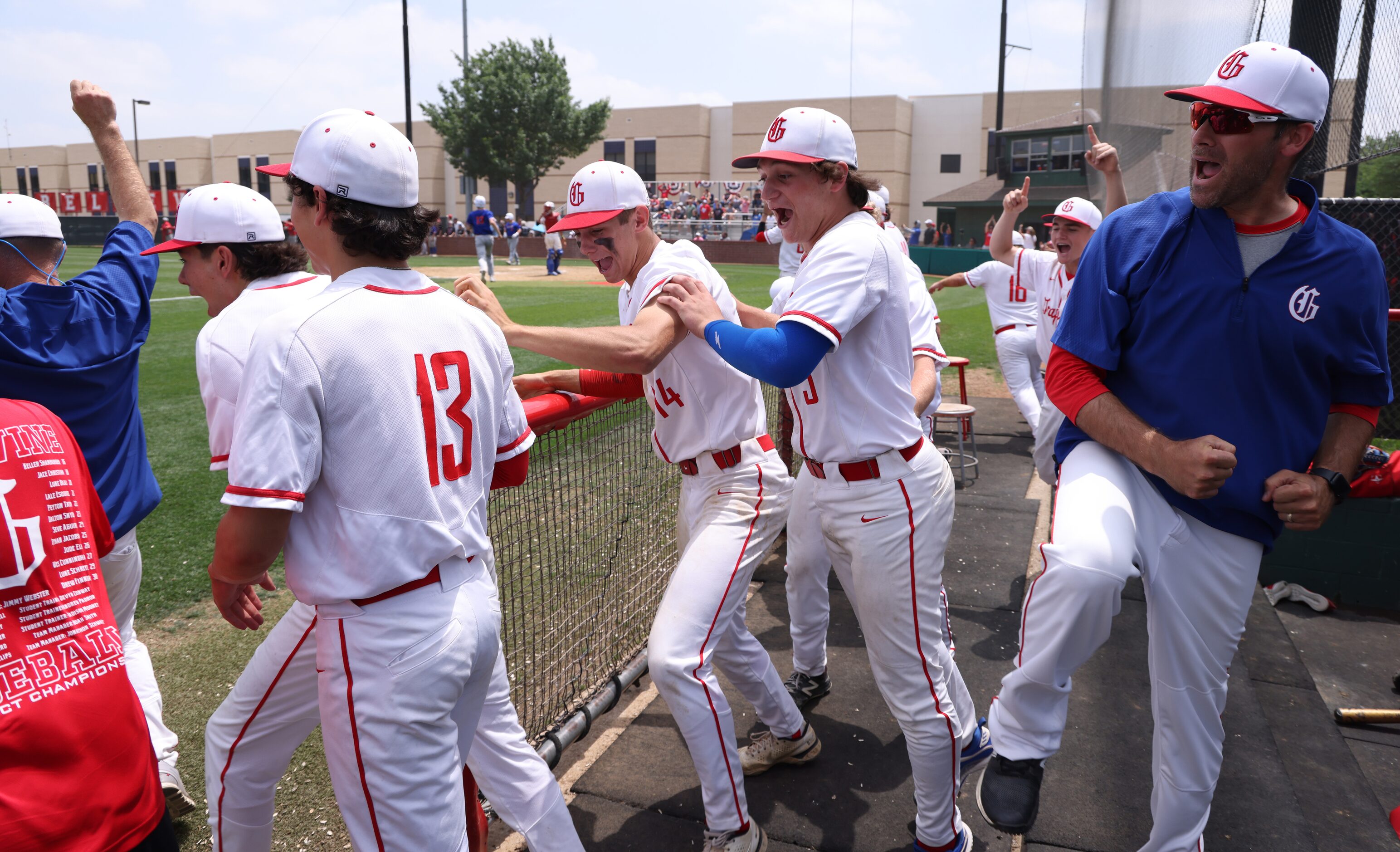 The Grapevine Mustangs dugout erupted after a diving catch sealed their 5-4 victory over...