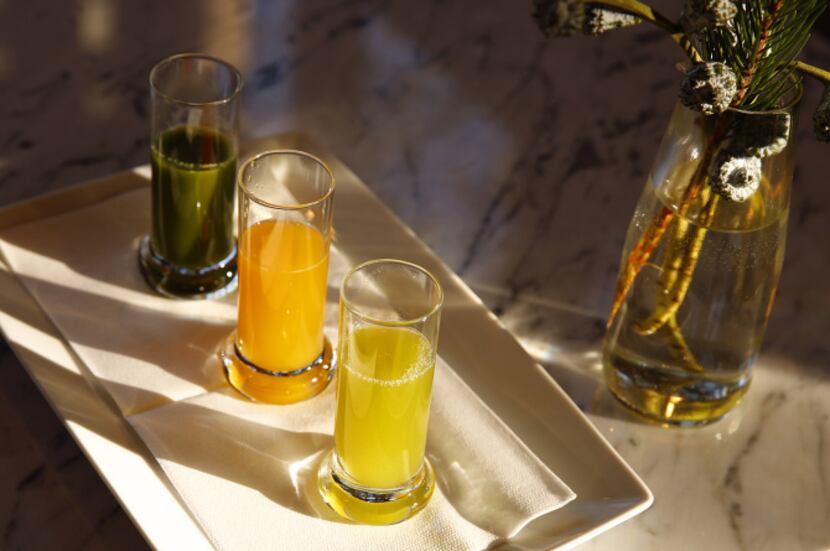 Shoppers can order a juice flight -- (from right) Pineapple Blend, Orange Blend and La Vie...