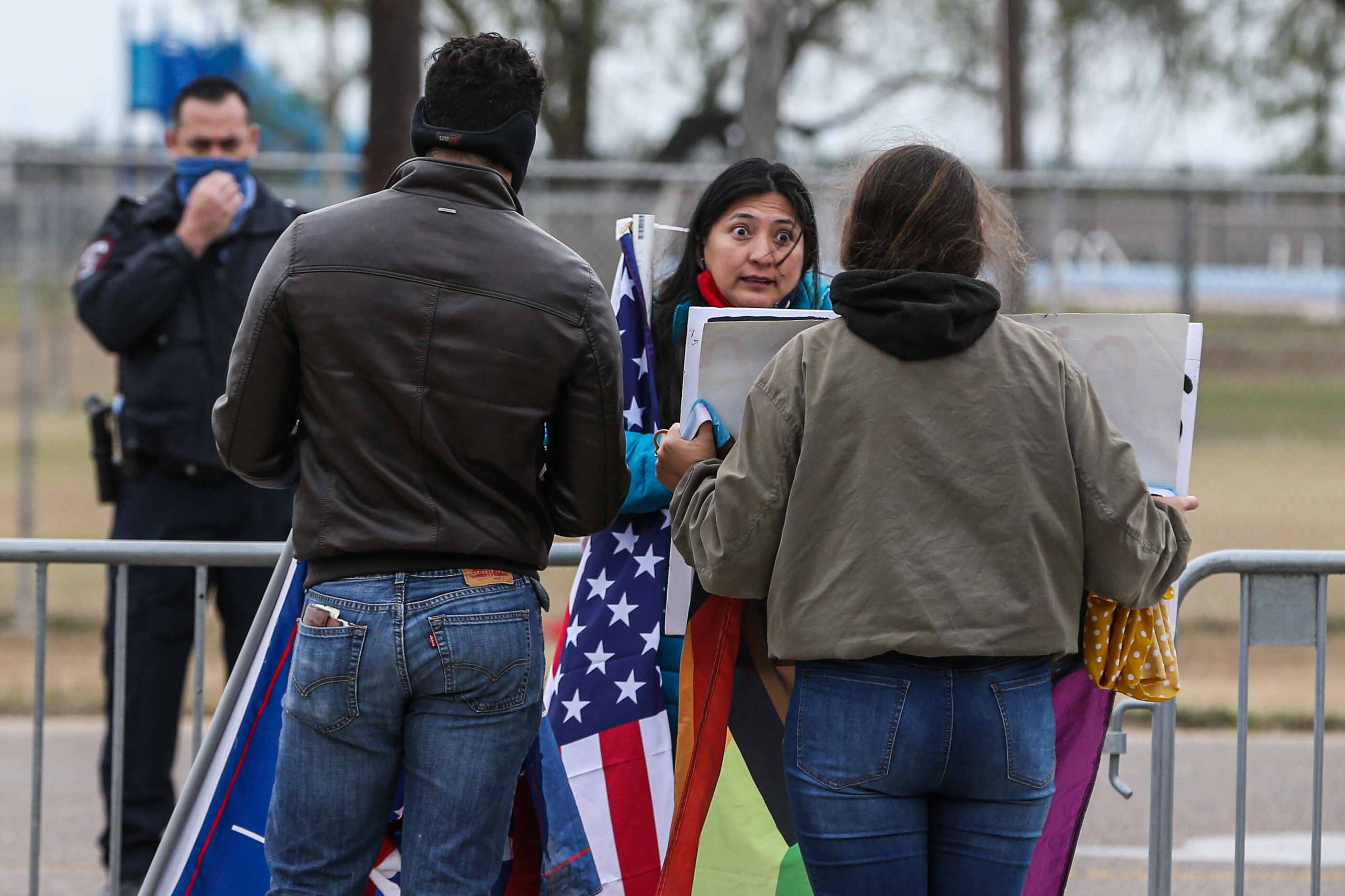 President Donald Trump supporters and president-elect Joe Biden supporters confront each...