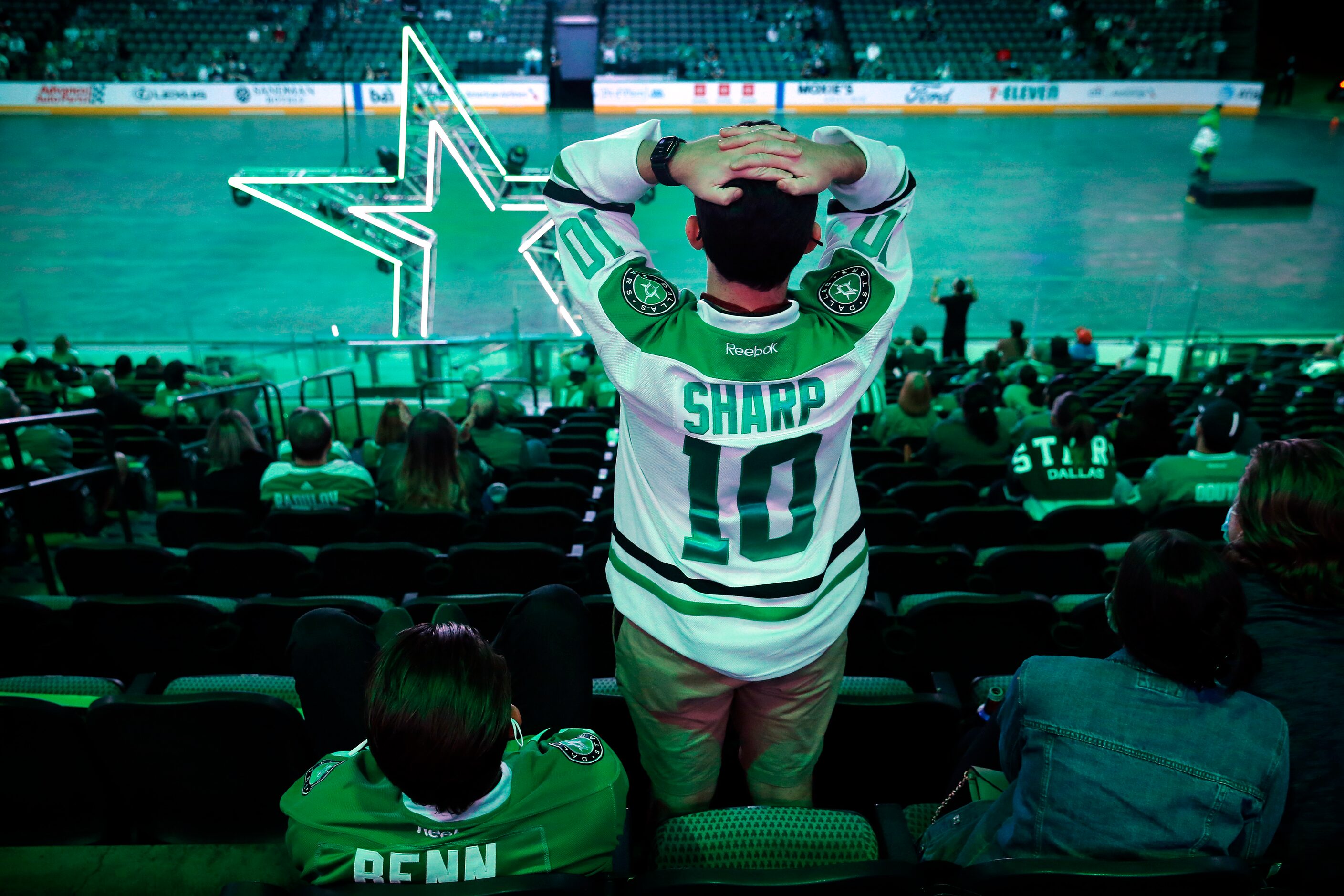 A nervous Dallas Stars fan watches the final seconds of regulation during a Stanley Cup...