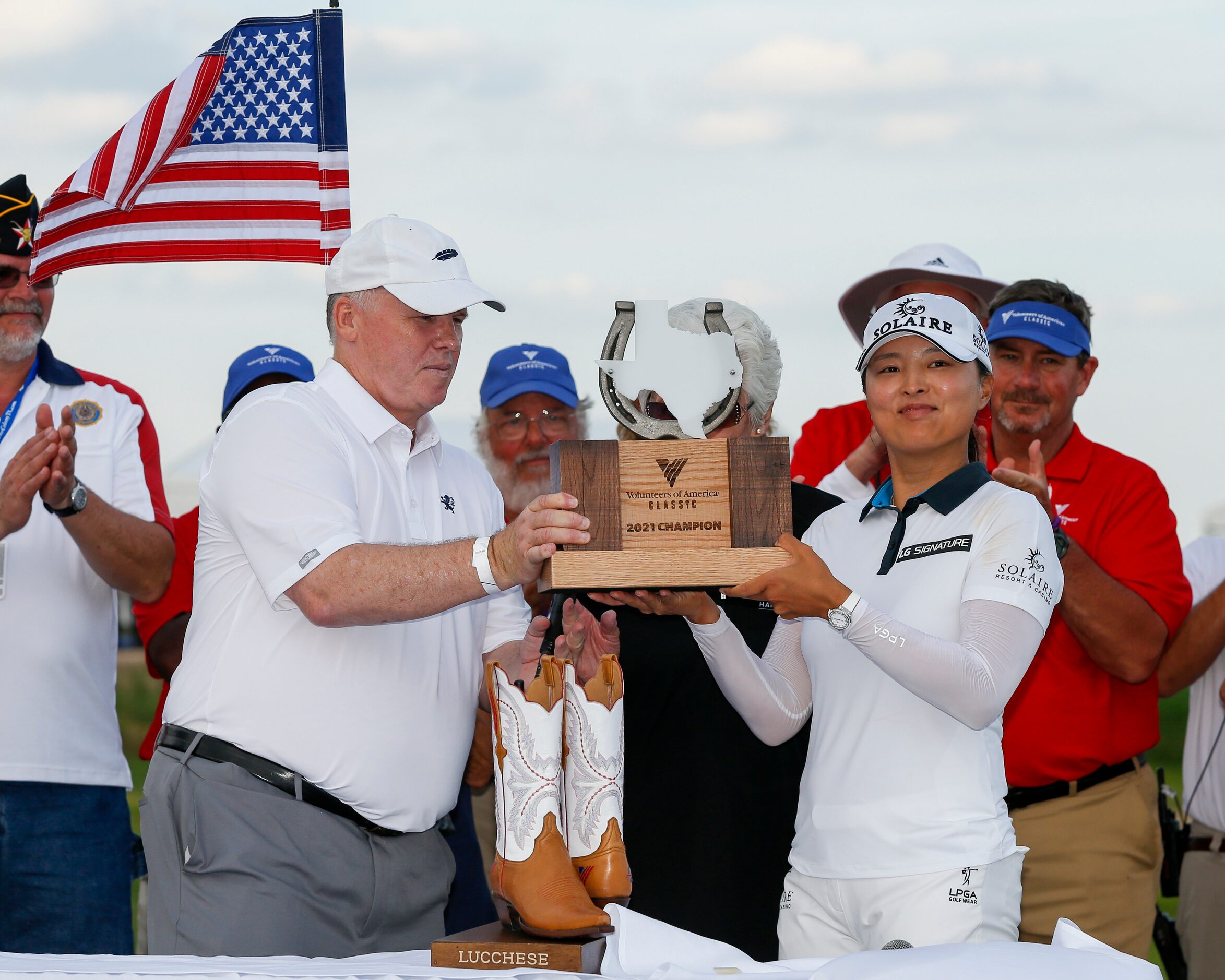 Professional golfer Jin Young Ko lifts the winner’s trophy after winning the LPGA VOA...