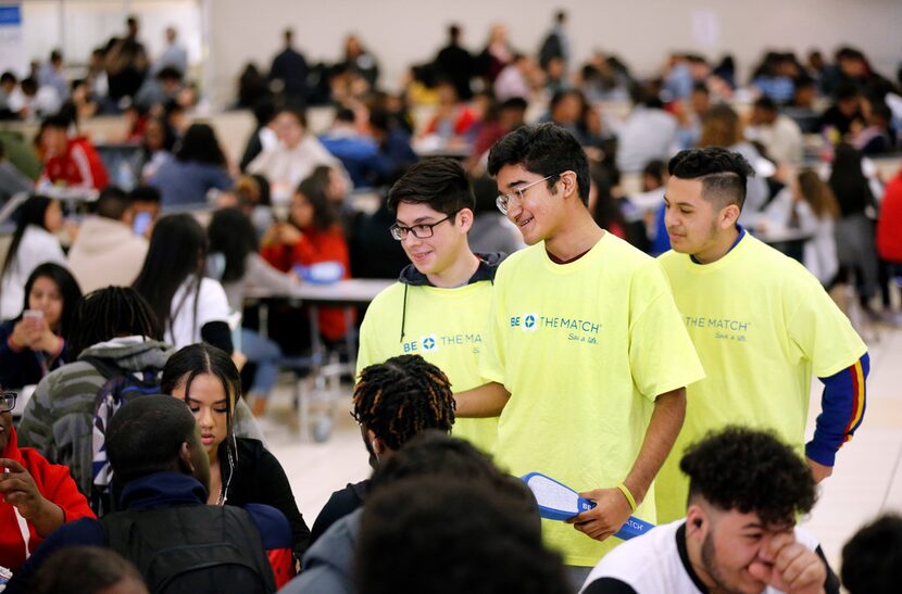 Duncanville High School freshman David Mojica (center) and his friends Isaac Rea (left) and...