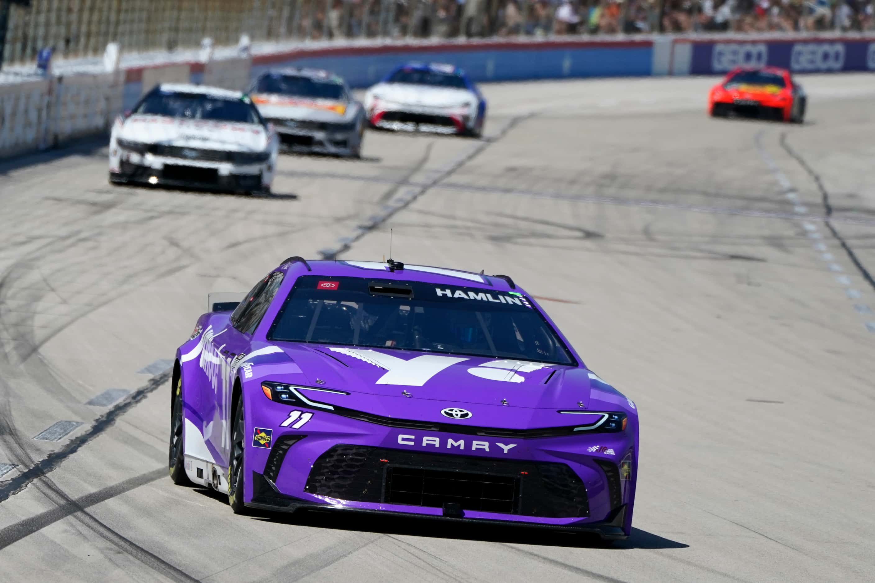Denny Hamlin (11) races into Turn 1 during a NASCAR Cup Series auto race at Texas Motor...