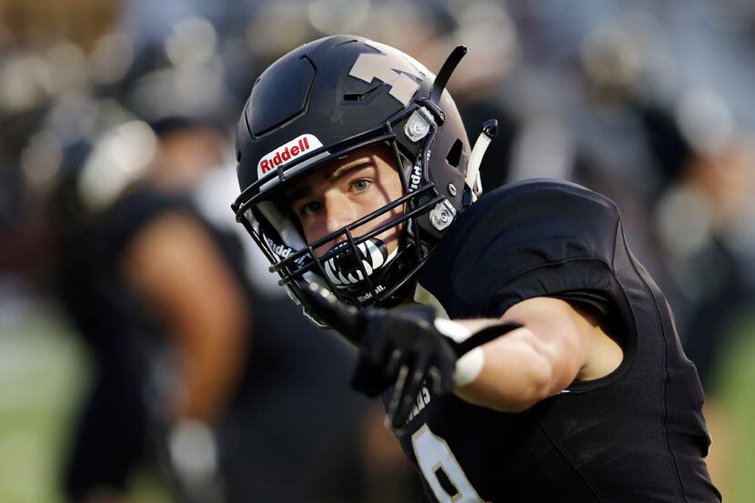 TXHSFB Mansfield senior wide receiver Jackson Gleeson (8) lines up during the first half of...