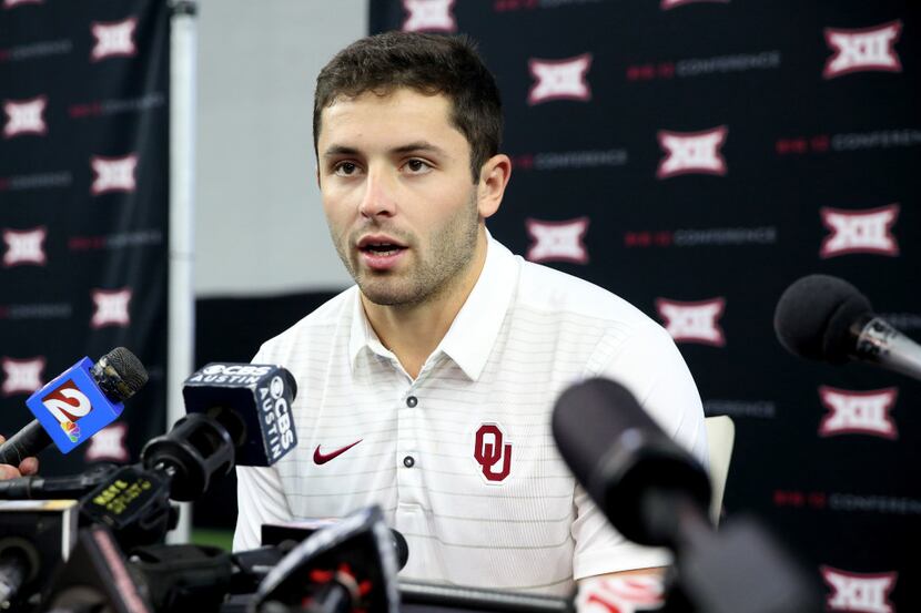 Oklahoma quarterback Baker Mayfield speaks during a press interview at the Big 12 Football...