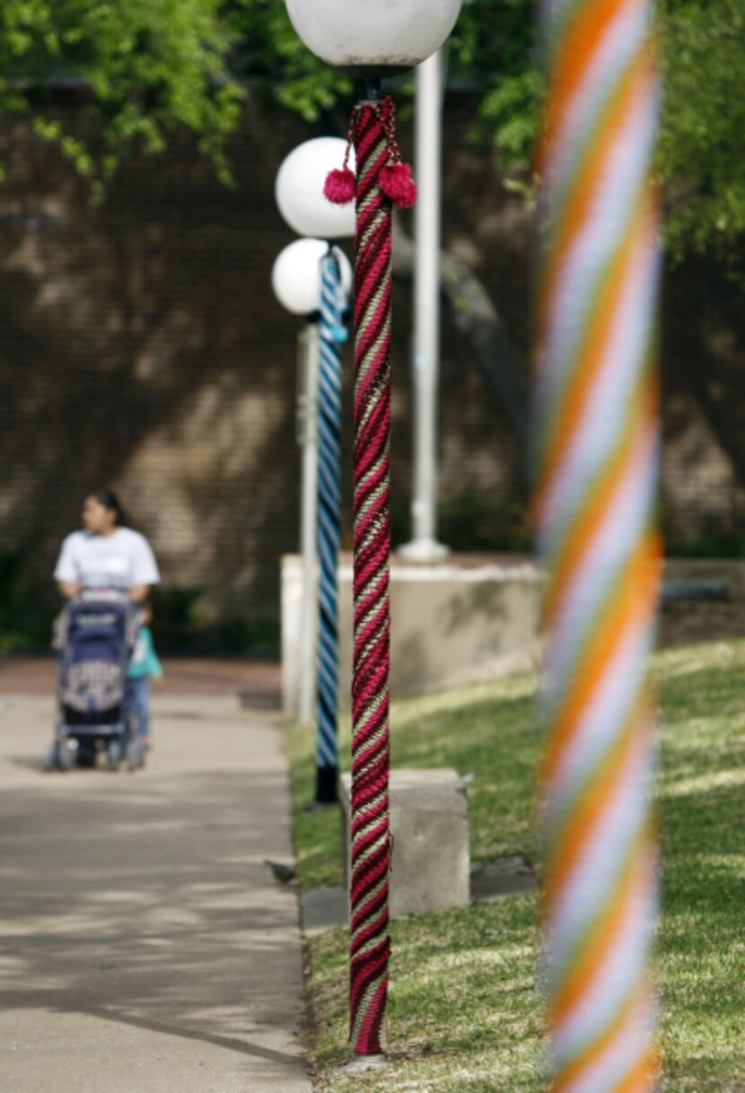 Yarn bombers like to use bright colors and sturdy yarn for their work. These three striped...