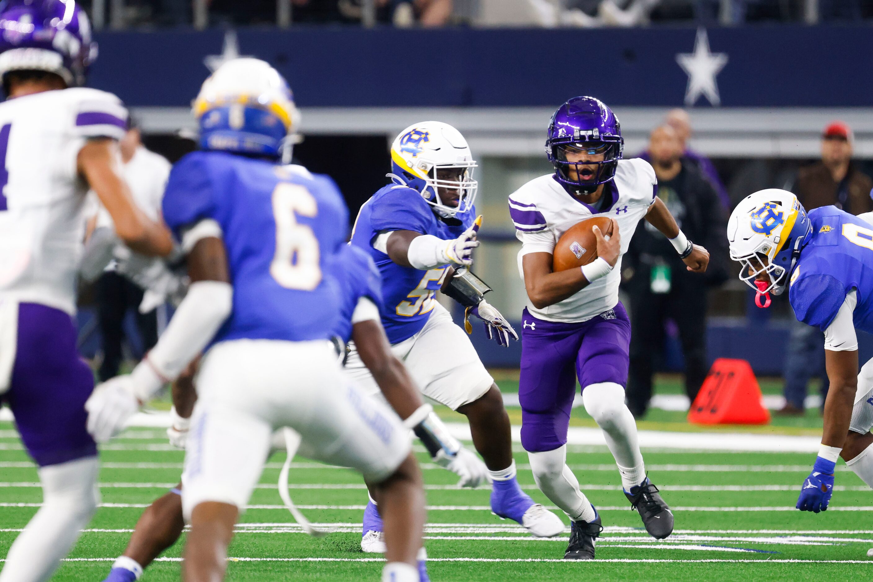 Anna High’s Ziondre Williams (center right) runs past Tyler Chapel Hill’s Dallas Gipson...