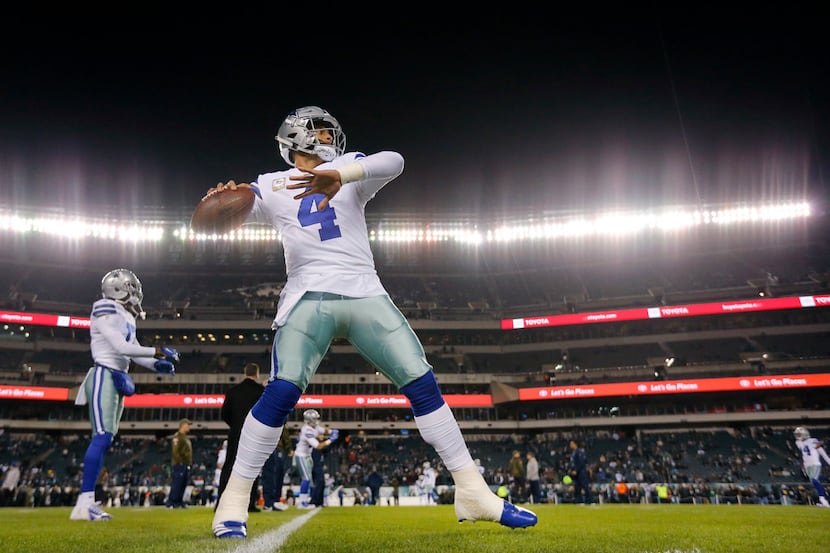 Dallas Cowboys quarterback Dak Prescott (4) throws the ball during pregame warmups before...