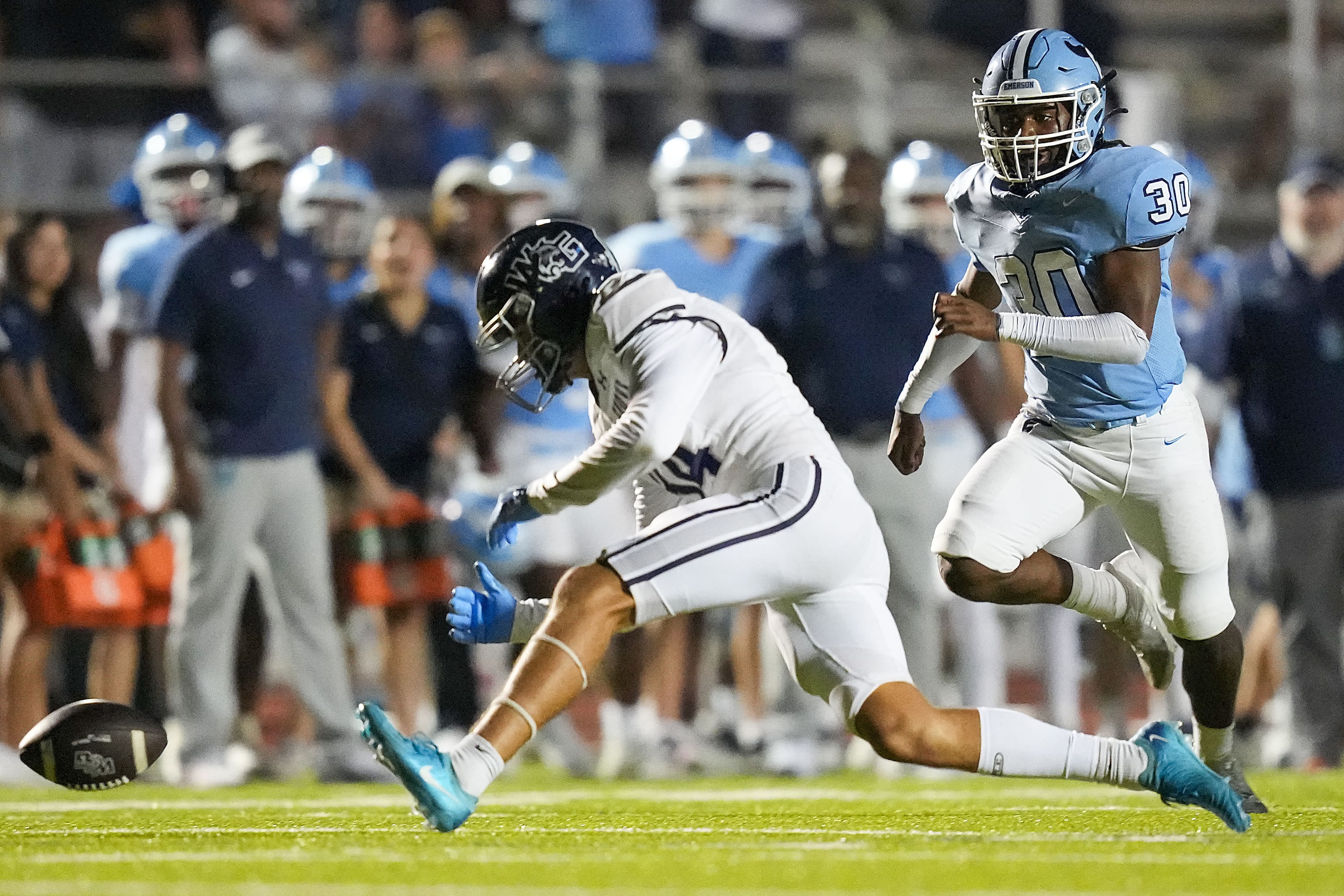 Prosper Walnut Grove punter Antonie Van Tonder (34) chases a fumbled snap in front of Frisco...