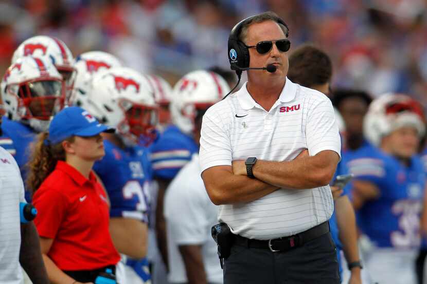 SMU head coach Sonny Dykes looks on from the team bench area during first half action...