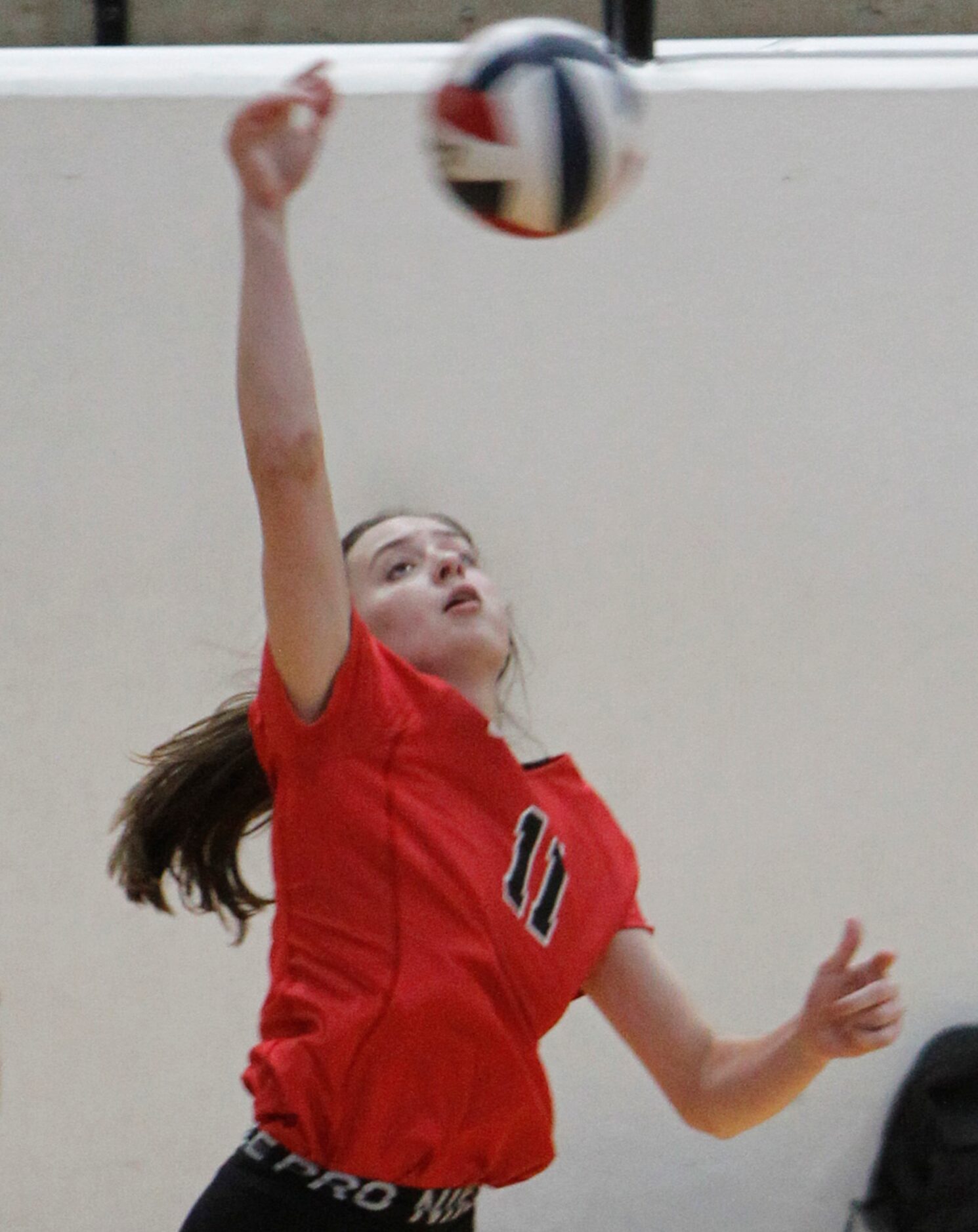 Arlington Martin's Madeline Hopp (11) returns the ball during the 3rd set of the Warriors'...