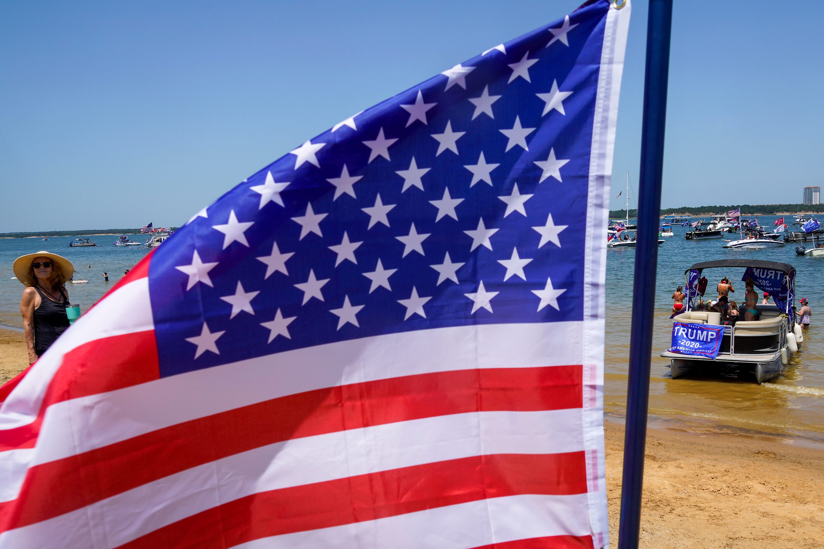 Boaters gather in support of President Donald Trump for a rally and boat parade at Oak Grove...