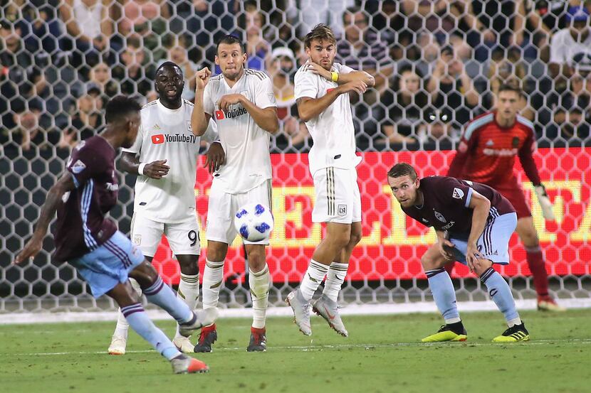 LOS ANGELES, CA - AUGUST 19: Kellyn Acosta #10 of Colorado Rapids takes a free kick as the...