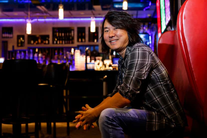 Encore Family Karaoke owner Jin Shin posed for a portrait at the Dallas business in May.