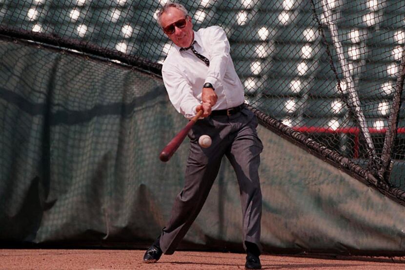 Rusty Rose takes a turn in the batting cage before the Texas Rangers' season opener on March...