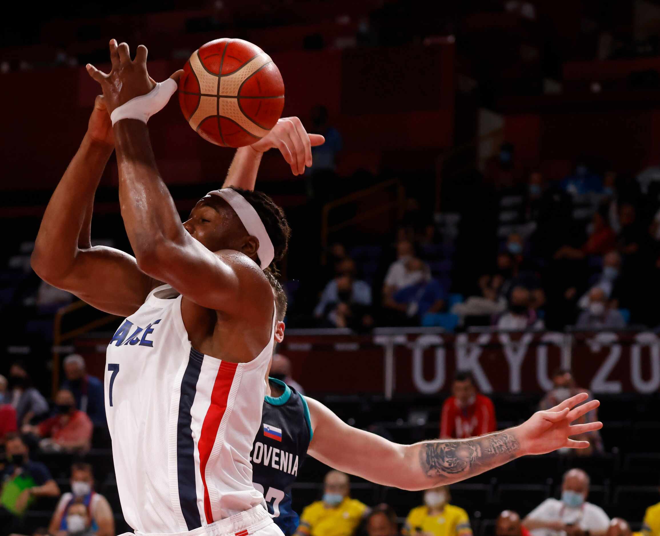 Slovenia’s Luka Doncic (77) blocks a shot from France’s Guerschon Yabusele (7) during the...