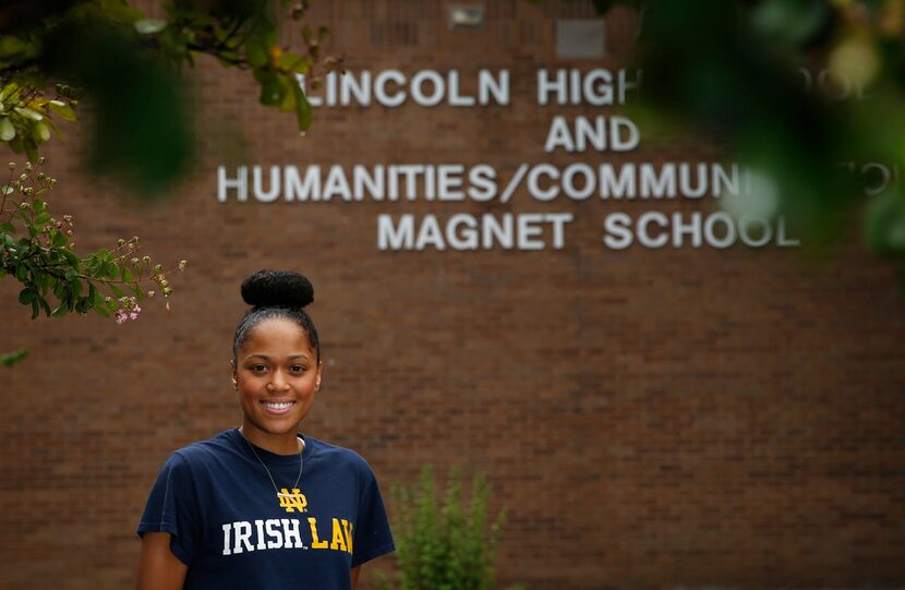 Cameasha Turner in front of Lincoln High School in Dallas, where she graduated in 2012.  