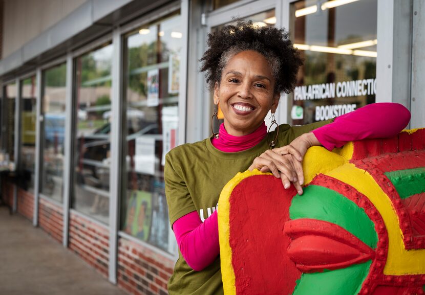 Akwete Tyehimba, owner of the Pan African Connection bookstore in Dallas, stands next to a...