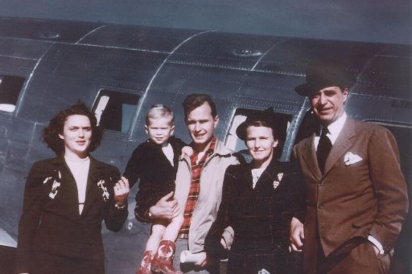 This 1948 photo shows the Bush family in Midland, Texas, posing for a photograph.  From left...