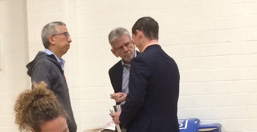 Dallas County Judge Clay Jenkins (right) discusses criminal justice reforms Sturday with Tom...