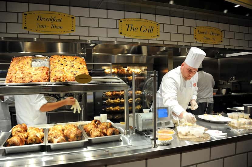 

Chef at The Grill, Robert Levin, prepares macaroni and cheese, corn bread, and rotisserie...