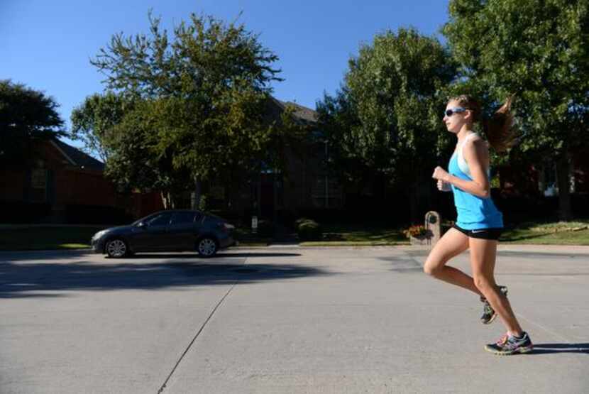 
Ariana Luterman, 13, runs down the street of her North Dallas neighborhood. Luterman formed...
