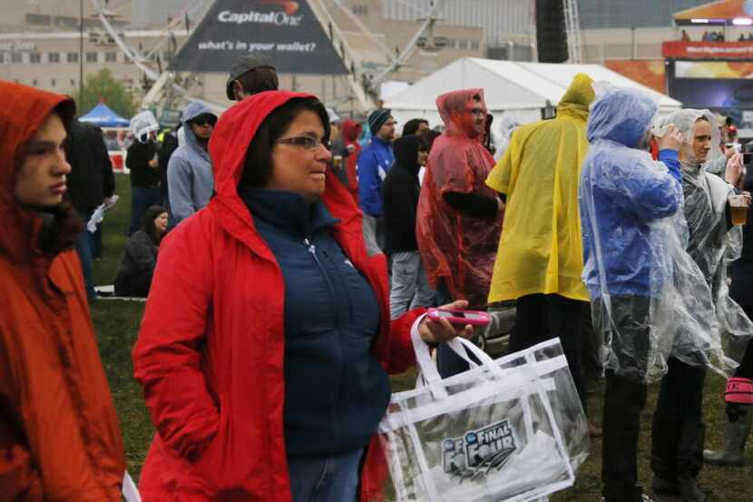 Music fans brave the elements to attend the March Madness Music Festival in Dallas on...