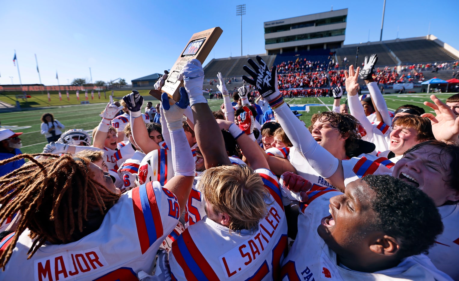 Parish Episcopal players celebrate their TAPPS Division I state championship win over...