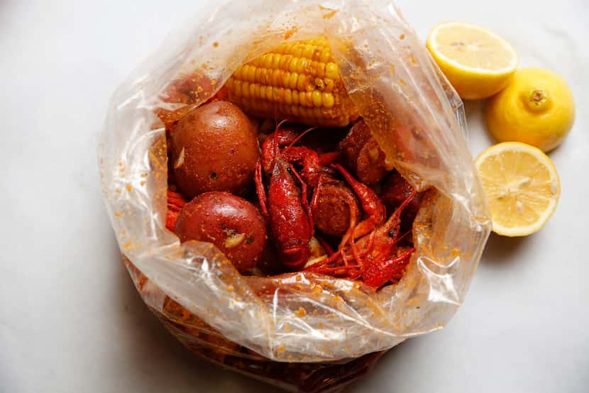 Crawfish, potatoes, corn and sausage photographed at The Boiling Crab in Dallas.