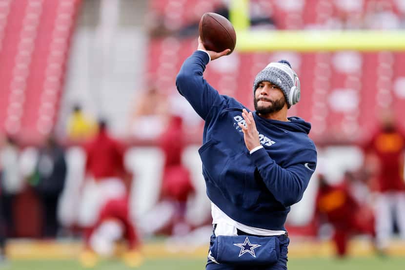 Dallas Cowboys quarterback Dak Prescott (4) throws a pass before an NFL football game...
