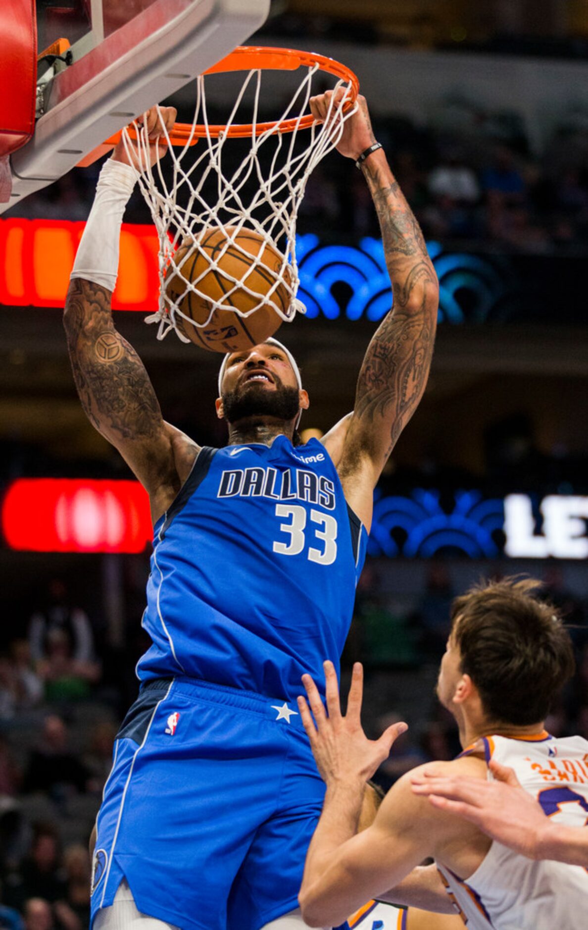 Dallas Mavericks center Willie Cauley-Stein (33) dunks during the fourth quarter of an NBA...