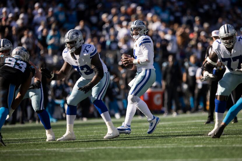 Dallas Cowboys quarterback Dak Prescott (4) looks before throwing during the first quarter...