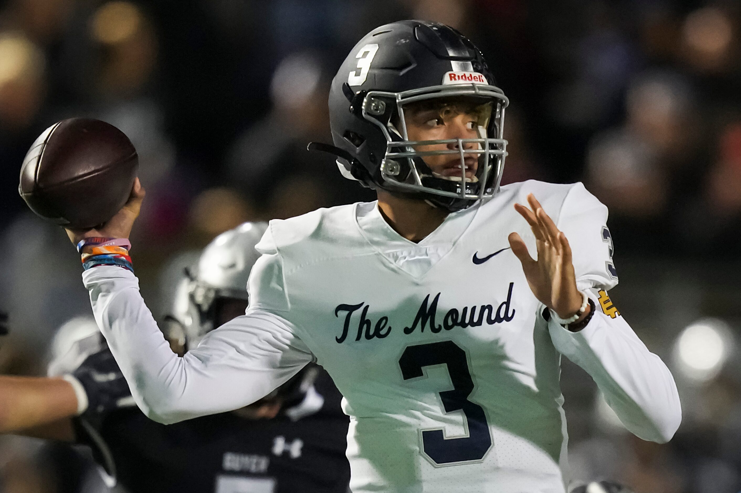 Flower Mound quarterback Nick Evers (3) throws a pass during the first half of a Class 6A...