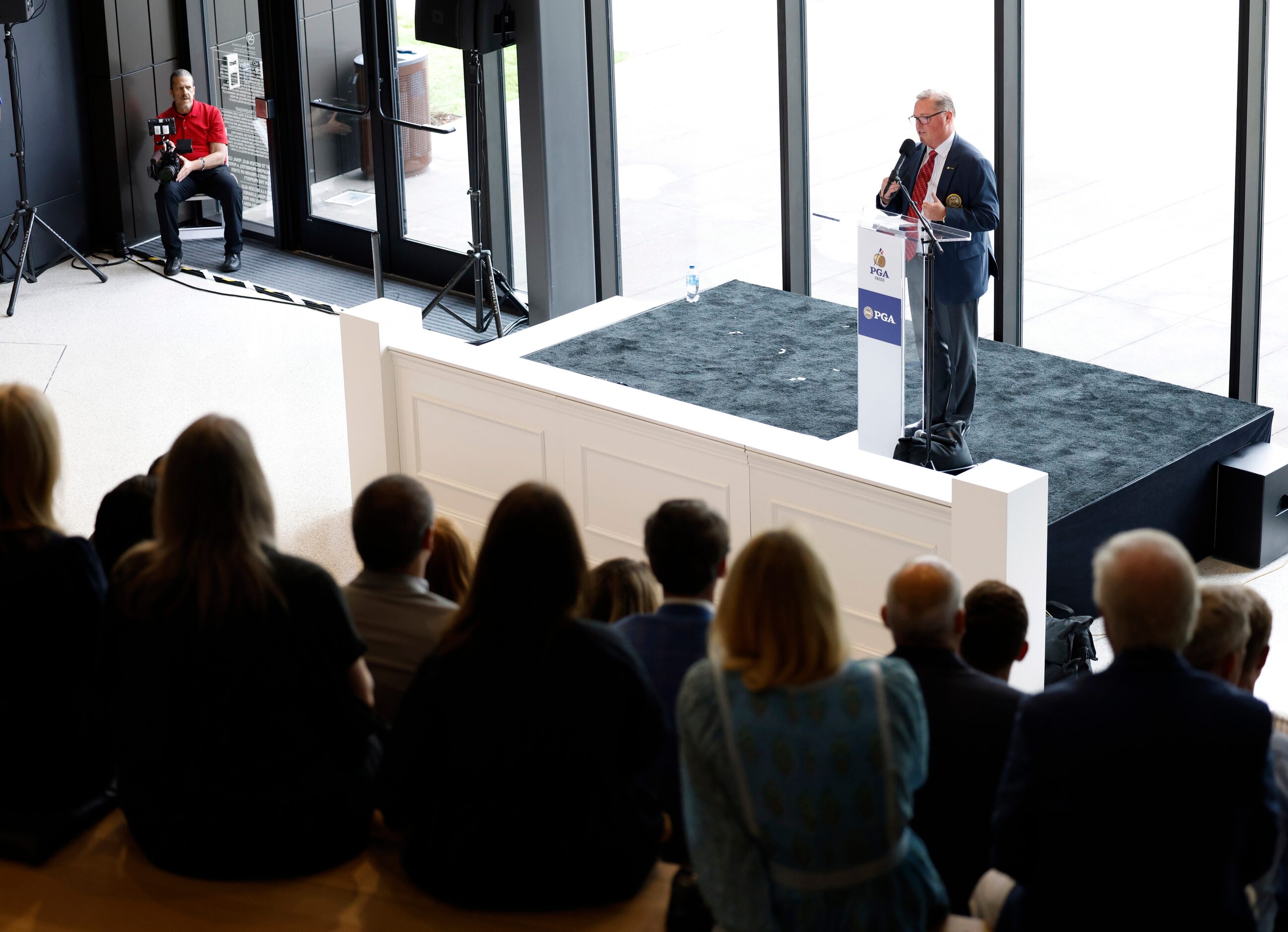 PGA of America president, Jim Richerson talks during a “Welcome Home Celebration,” event at...