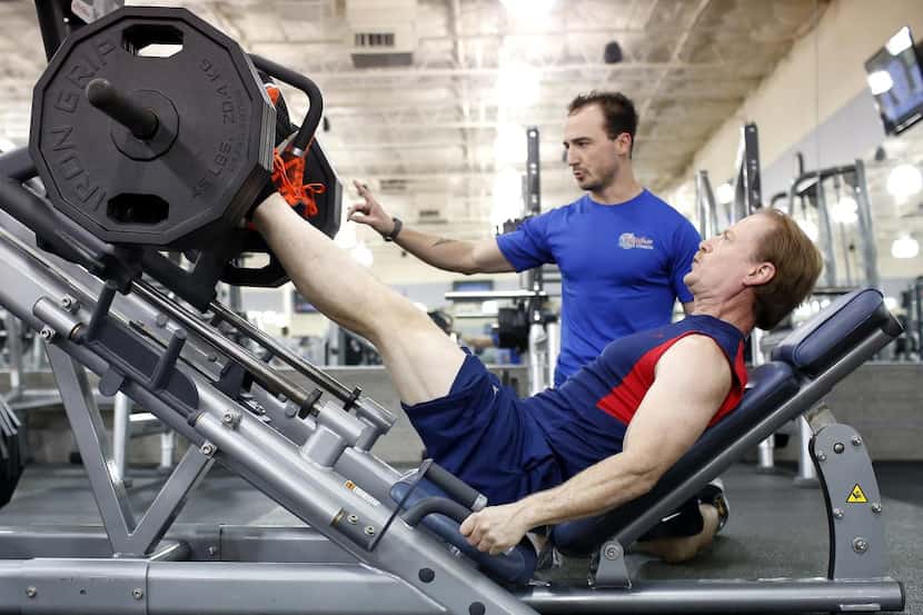 
Wayne Bullard works out with trainer Matt Fox at Texas Family Fitness in The Colony.
