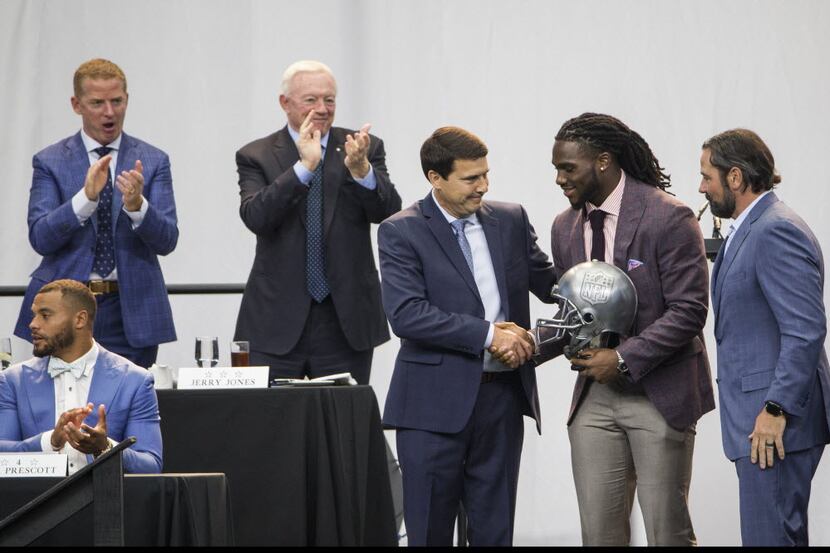 Jaylon Smith (second from right) is presented the Courage Award during the annual Cowboys...
