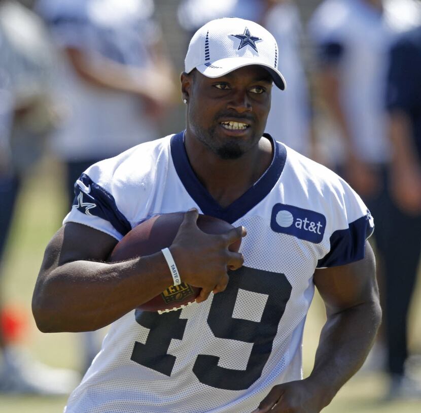 Dallas Cowboys fullback Jamize Olawale (49) runs during their walk-thru practice at training...