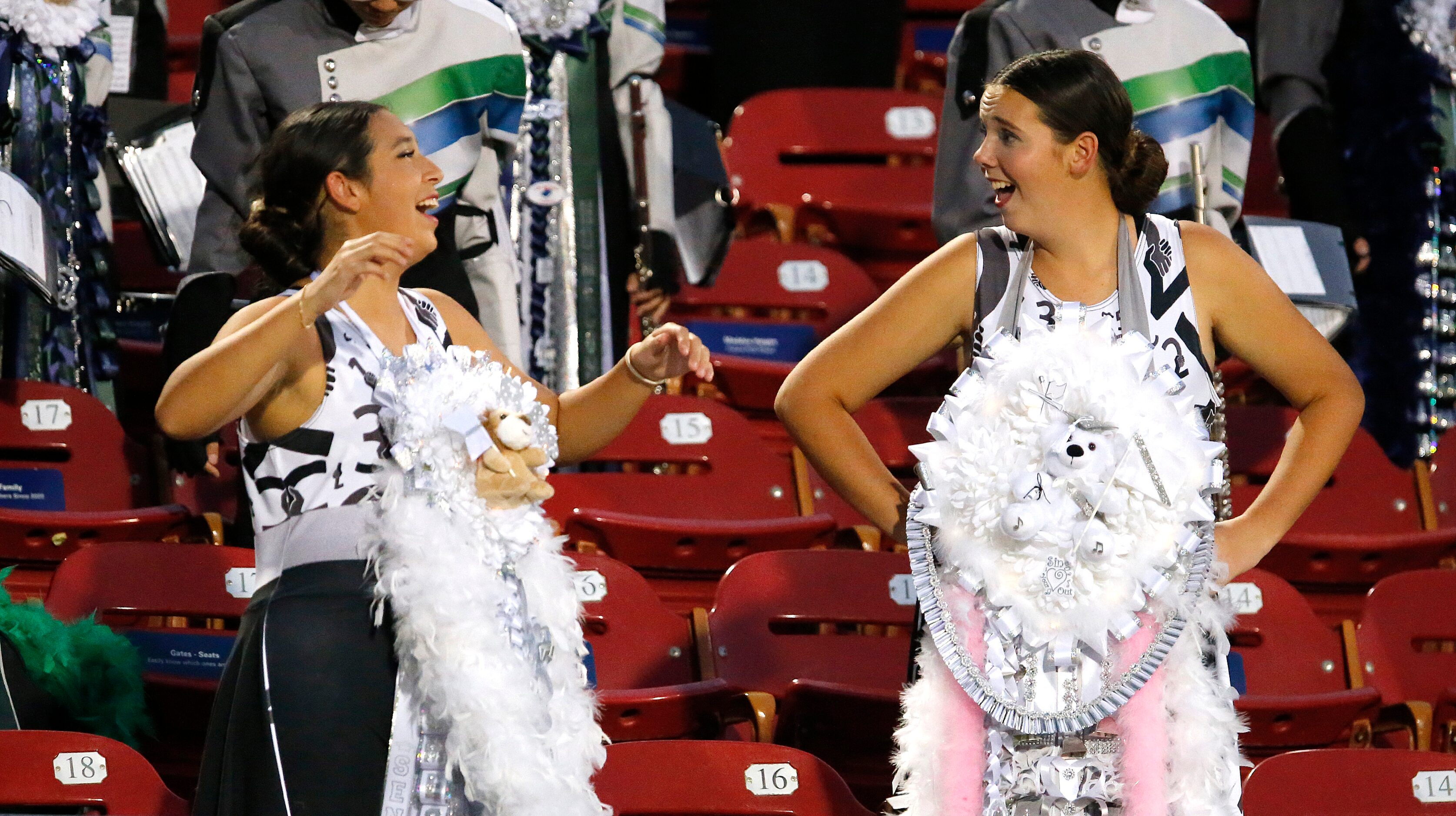 Reedy High School Color Guard members Cienna Chavira (left), 17, and Amber Smith, 17, wore...