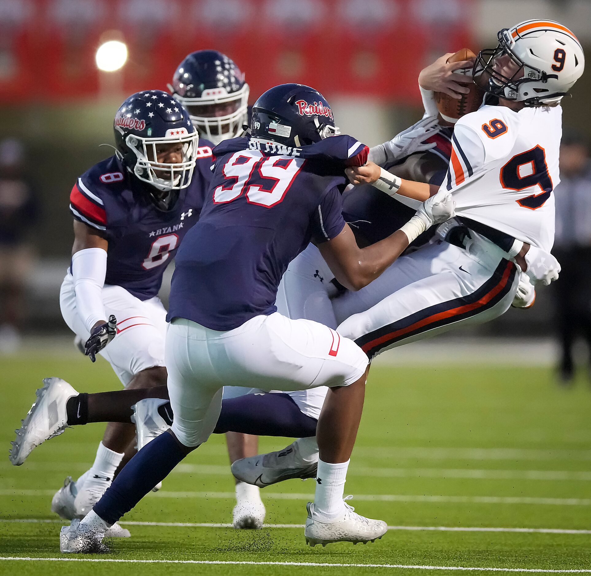 Frisco Wakeland quarterback Brennan Myer (9) is sacked by Denton Ryan defensive tackle...