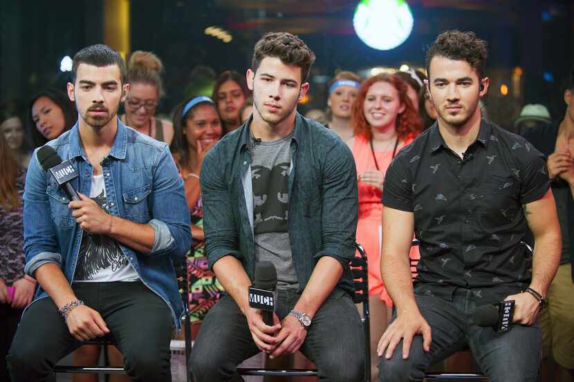 Joe Jonas, Nick Jonas, and Kevin Jonas are seen at Live at Much With Jonas Brothers at the...