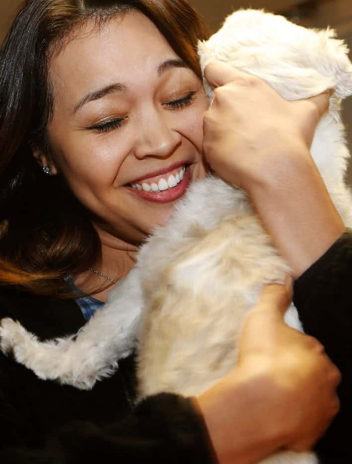 Jessica Urbina cradled Bam Bam, with whom she was reunited after he was missing for four...