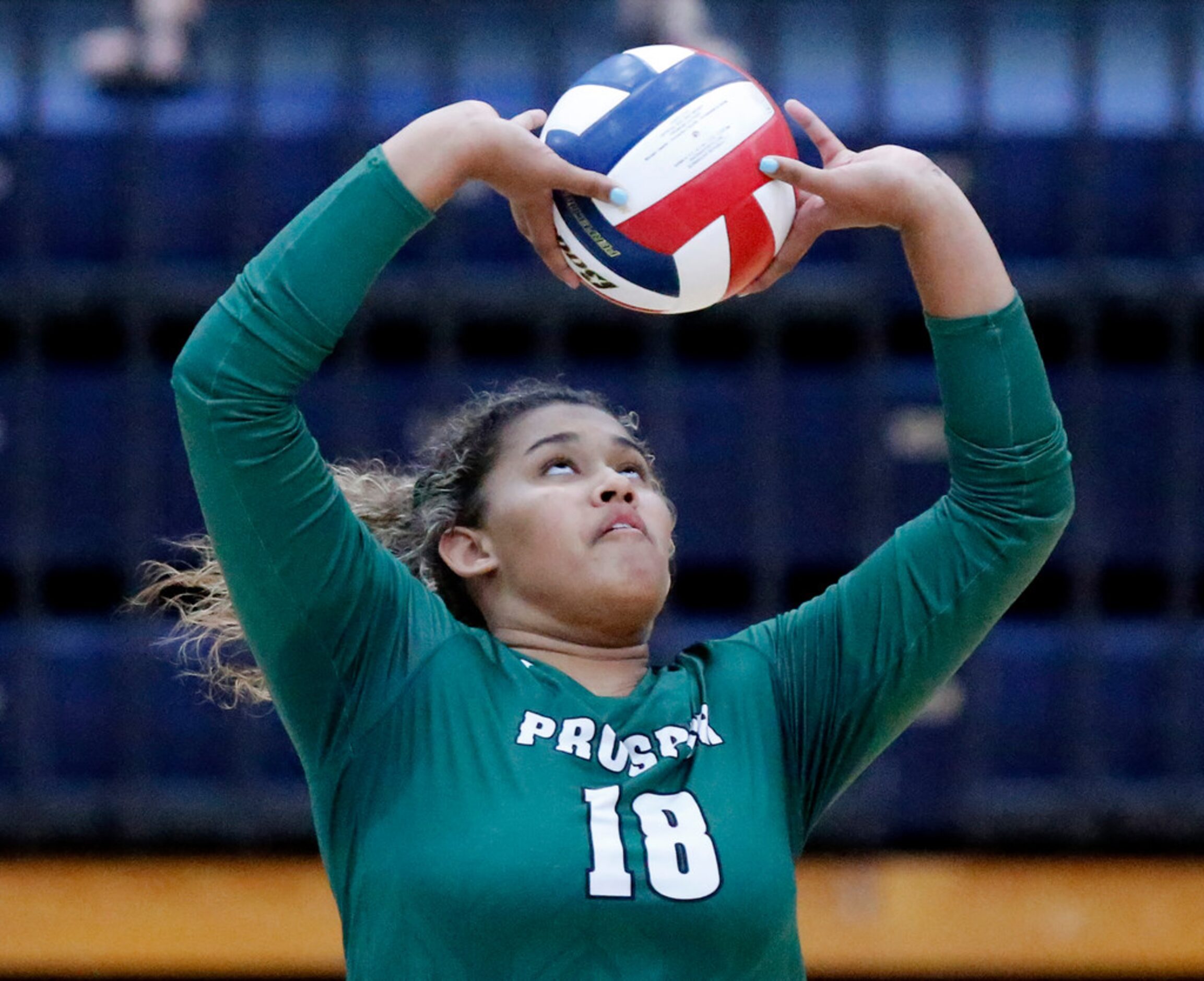 Prosper High School setter Mackenzie Jefferson (18) makes a set during game two as Allen...