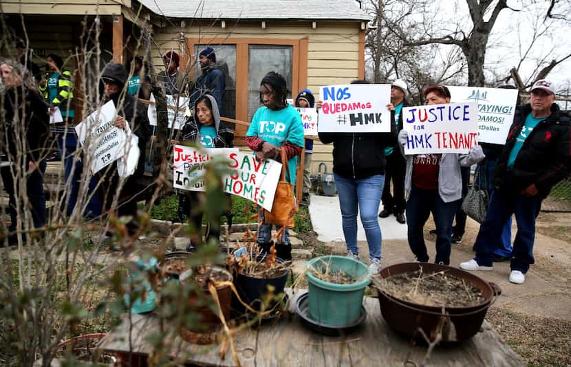 West Dallas tenants of HMK Ltd. address a news conference Thursday about their eight-point...