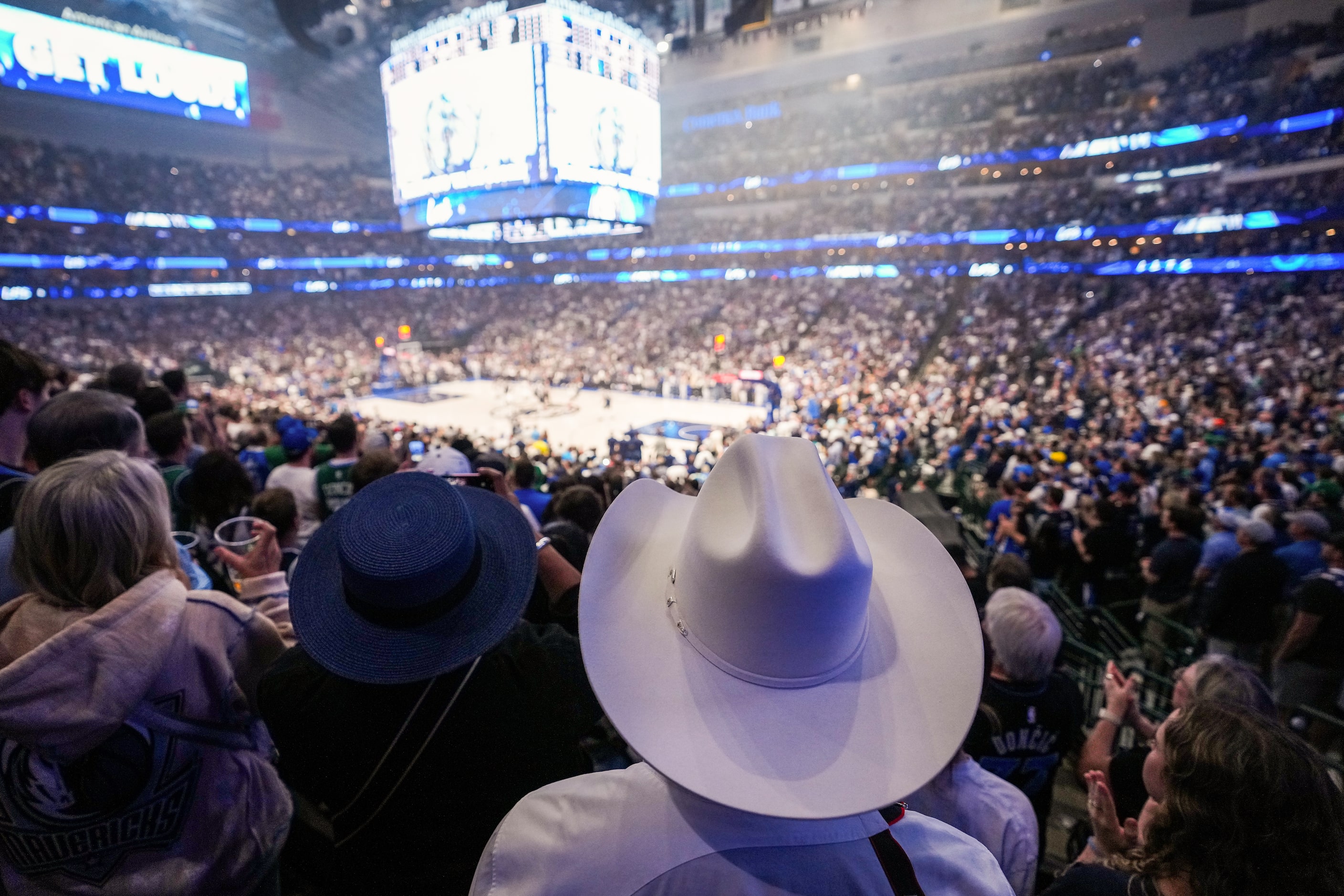 Fans stand for the opening tipoff during the first half in Game 4 of the NBA basketball...