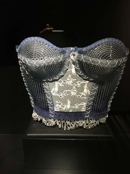 Susan Taylor Glasgow's glass corsets on display at Hotel Murano  have "embroidery" that...