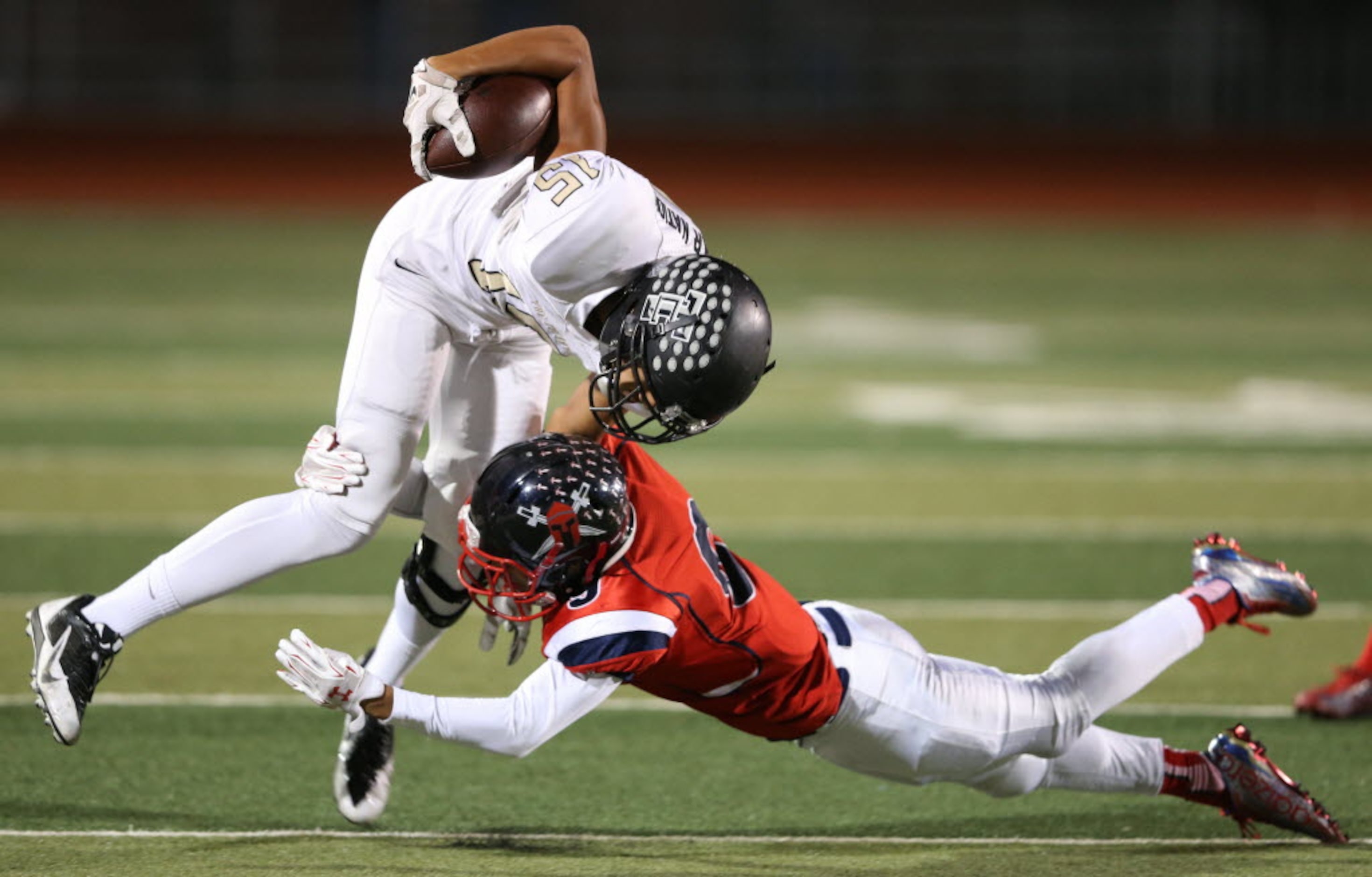 The Colony's Chris Green (15) runs up the field on a pass play as Frisco Centennial's...